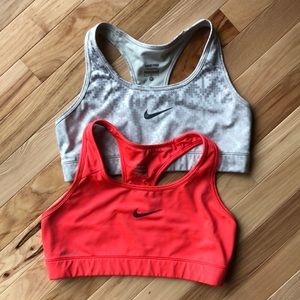 2 Nike Dri-fit sports bras.